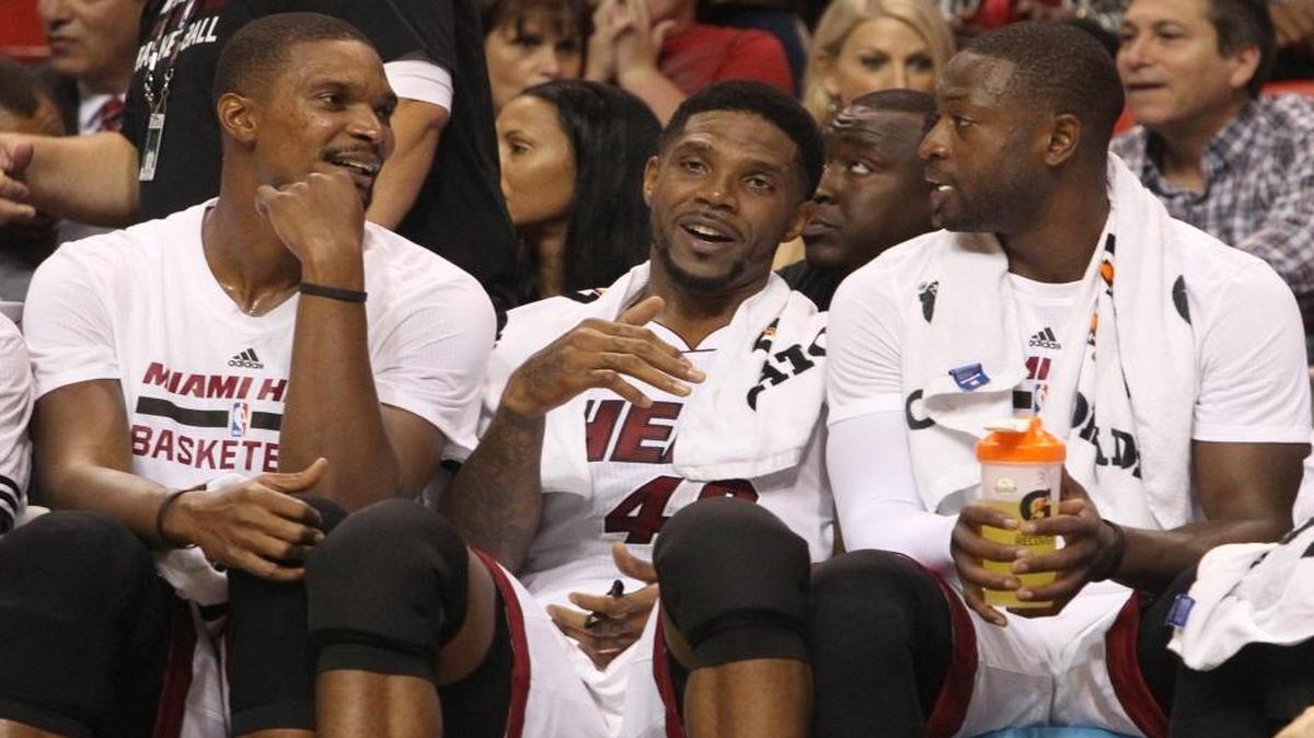 “If you can’t be motivated with the way last season ended, then you don’t deserve to be playing,” said Miami Heat forward Udonis Haslem, center, flanked by Chris Bosh, left, and Dwyane Wade. 