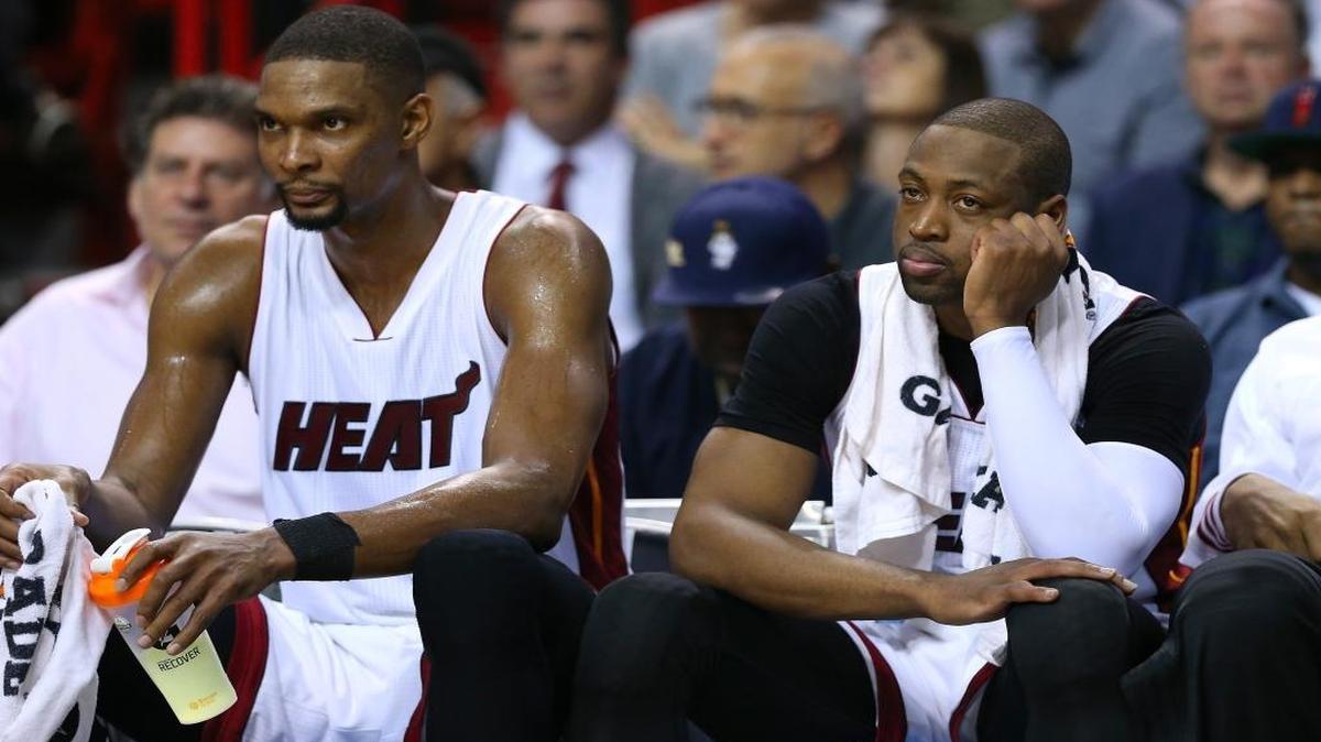 Heat players Chris Bosh, left, and Dwyane Wade show their dejection during the fourth quarter in a 91-79 loss to the Milwaukee Bucks at AmericanAirlines Arena in Miami on Tuesday, January 19, 2016. Wade scored only two points on 1-of-6 shooting.
