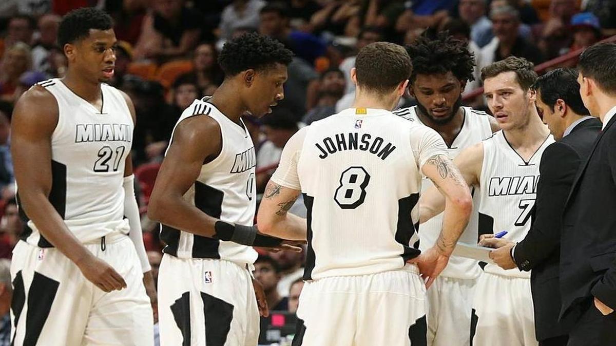 Miami Heat head coach Erik Spoelstra talks with players during a time out as they lead in the fourth quarter of their game against the Los Angeles Lakers at AmericanAirlines Arena in Miami on Thursday, December 22, 2016.