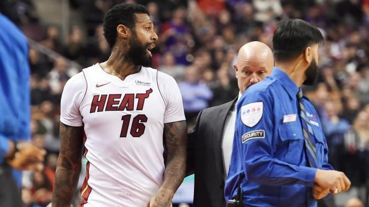 Miami Heat forward James Johnson is ejected from the game along with Toronto Raptors forward Serge Ibaka, not seen, during the second half of an NBA basketball game Tuesday, Jan. 9, 2018, in Toronto.