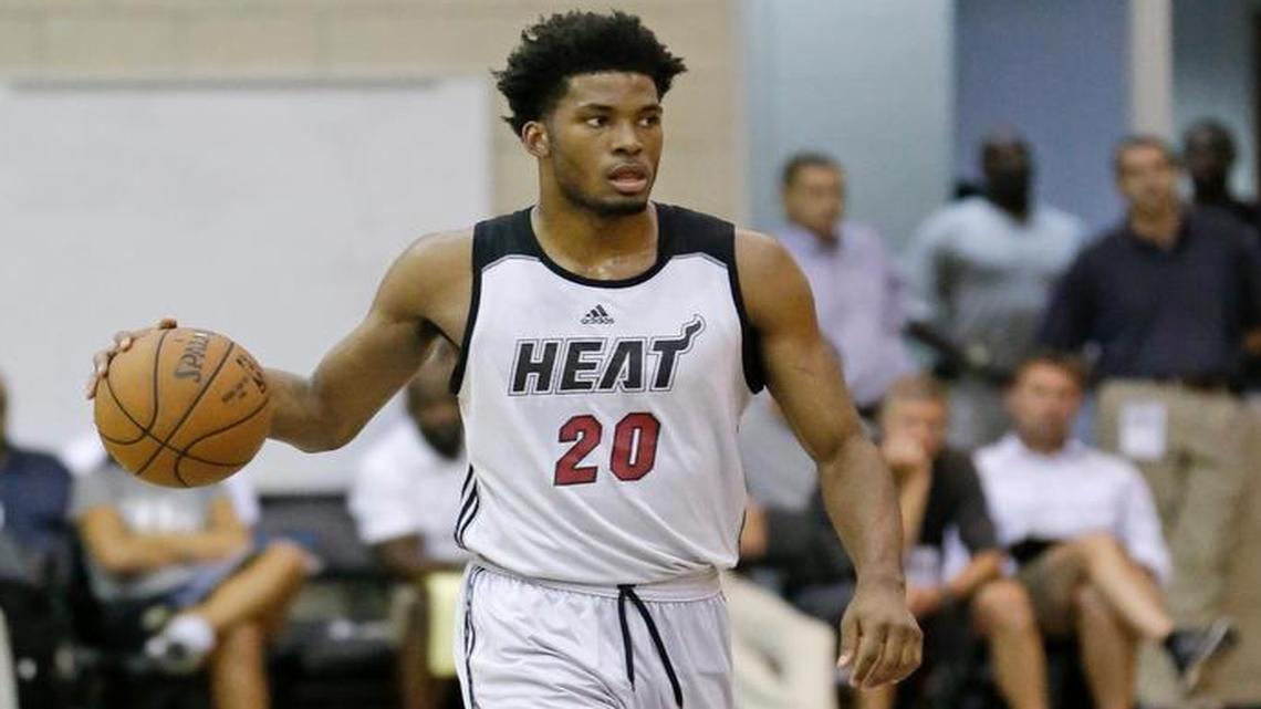 
Miami Heat's Justise Winslow (20) moves the ball against the Los Angeles Clippers during the first half of an NBA summer league basketball game, Wednesday, July 8, 2015, in Orlando, Fla. 
