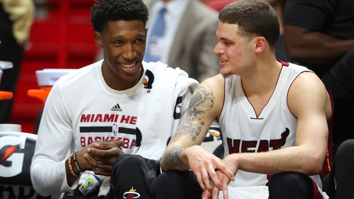 Miami Heat guard Josh Richardson, left, and teammate guard Tyler Johnson talking in the fourth quarter of a preseason NBA basketball game against the Orlando Magic at AmericanAirlines Arena on Tues., Oct. 18, 2016, in Miami.