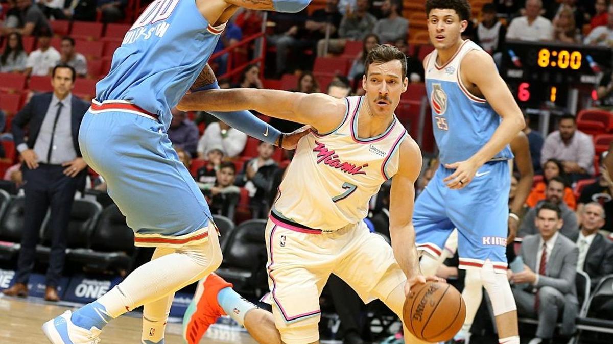 Heat guard Goran Dragic drives to the basket against Kings’ center Willie Cauley-Stein, in the first quarter of the Miami Heat vs Sacramento Kings game at AmericanAirlines Arena in Miami on Thursday, Jan. 25, 2018.