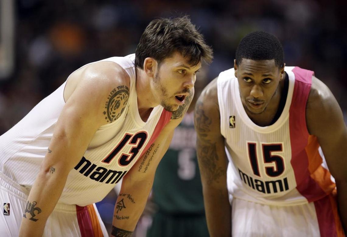 Miami Heat players Mike Miller (13) and Mario Chalmers (15) are shown during a game against the Milwaukee Bucks on Sunday, Jan. 22, 2012 in Miami.