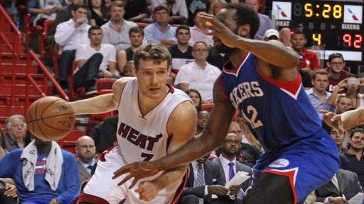 
With new point guard Goran Dragic pushing the pace and scoring 23 points, the Heat had enough offense to beat the 76ers. Dragic also contributed 10 assists.
