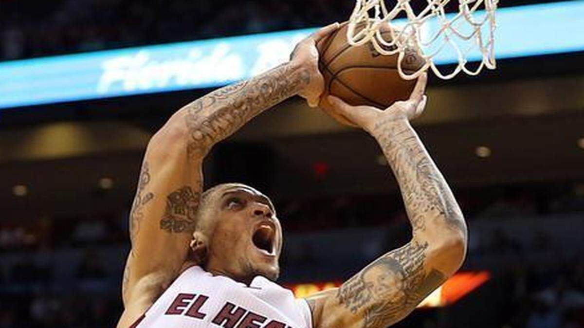 
Miami Heat forward Michael Beasley goes to the basket against the Sacramento Kings at AmericanAirlines Arena in Miami on Saturday, March 7, 2015.
