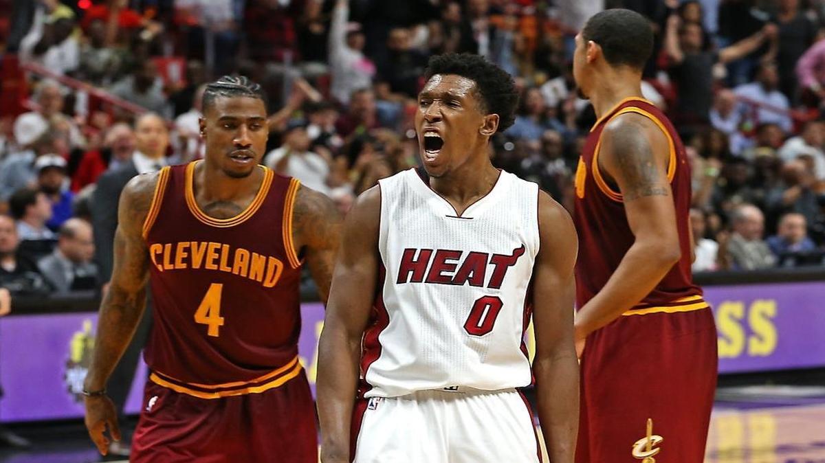 Heat's Josh Richardson (0) celebrates a made shot as the Miami Heat hosts the Cleveland Cavaliers on Monday, April 10, 2017.