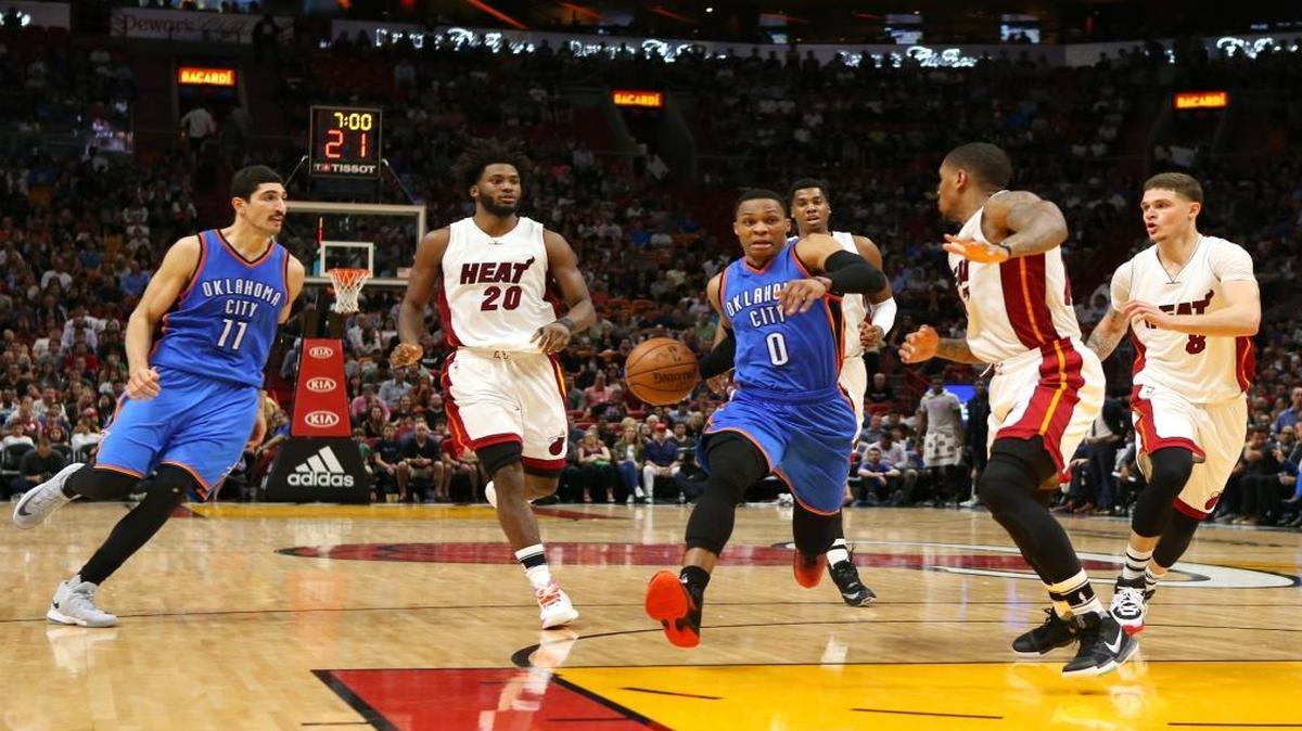 Oklahoma City Thunder guard Russell Westbrook drives to the basket against Miami Heat guard Rodney McGruder during the fourth quarter of an NBA basketball game at AmericanAirlines Arena in Miami on Tues., Dec. 27, 2016.