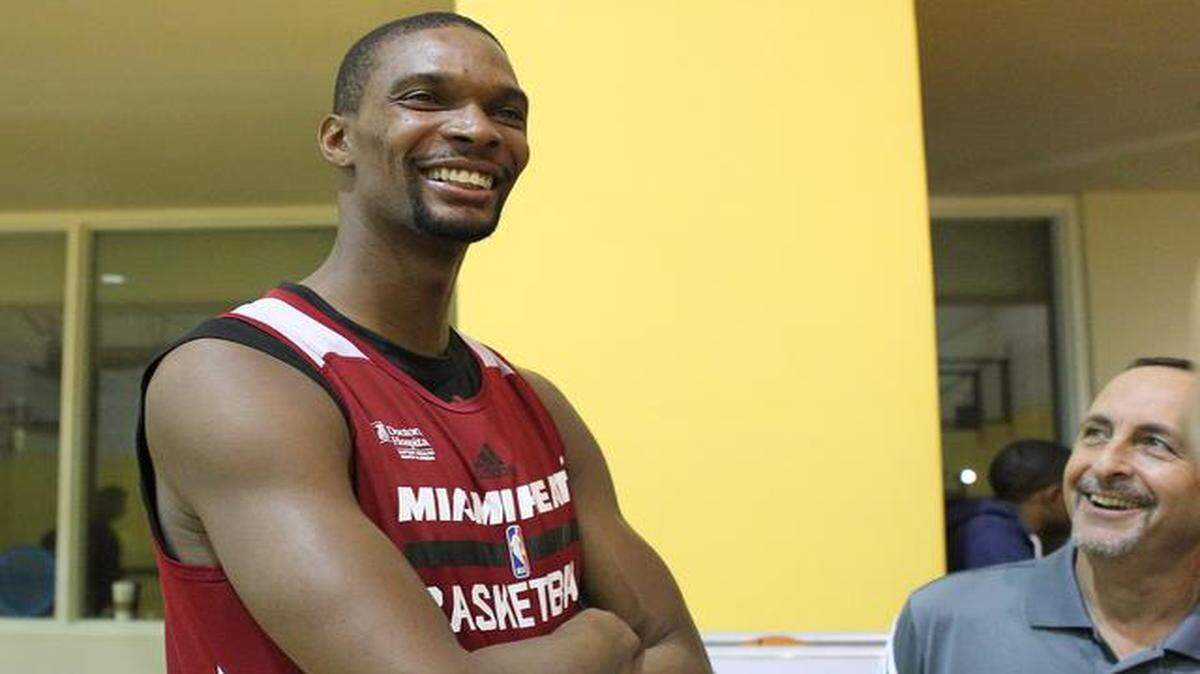 
Miami Heat center Chris Bosh talks with the media during practice at AmericanAirlines Arena in Miami on Tuesday, October 28, 2014, in preparation for the season opening game against the Washington Wizards on Wednesday.
