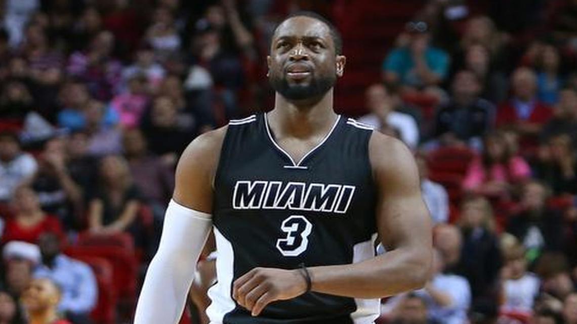 
Miami Heat guard Dwyane Wade reacts after a play during the fourth quarter of an NBA basketball game against the New Orleans Pelicans at AmericanAirlines Arena in Miami on Saturday, February 21, 2015
