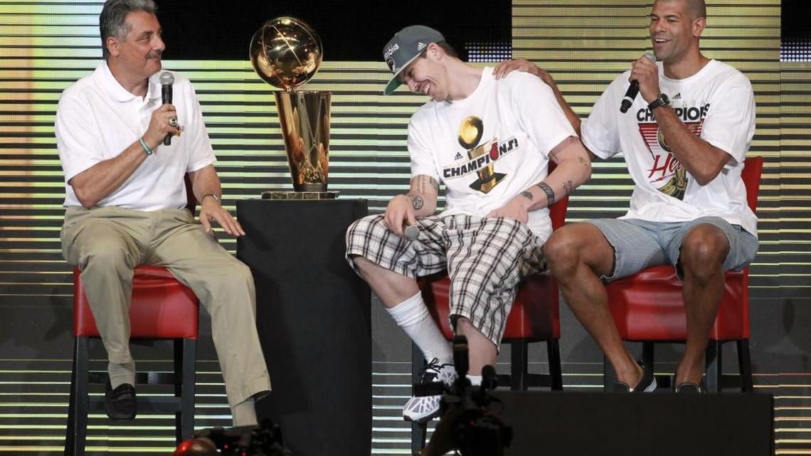 The Miami Heat’s Shane Battier compliments teammate Mike Miller during an on-stage interview with Heat TV analyst Tony Fiorentino during the team’s championship celebration at the AmericanAirlines Arena on June 25, 2012.