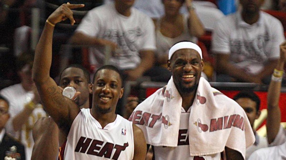 Miami Heat players Mario Chalmers, left, and LeBron James react in the last minutes of the fourth quarter as they win Game 5 of the quarterfinal playoff series against the Indiana Pacers at AmericanAirlines Arena in Miami on Tuesday, May 22, 2012.