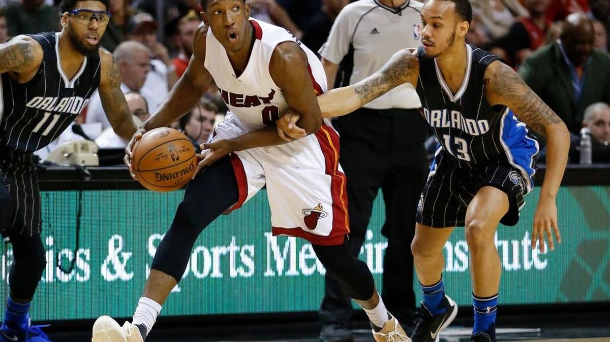 Josh Richardson, center, is the third player in Miami Heat history to be named NBA Rookie of the Month.