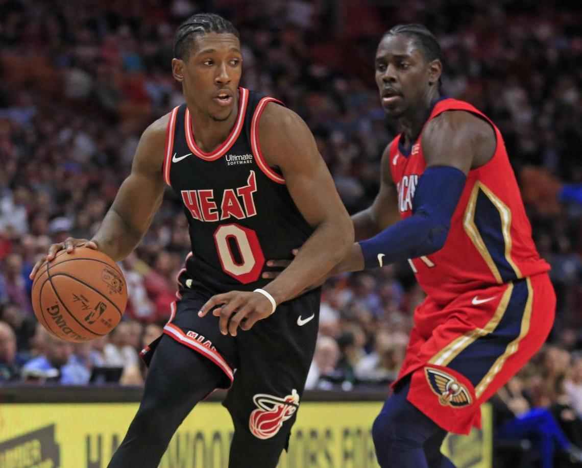 Miami Heat forward Josh Richardson looks to pass as New Orleans Pelicans guard Jrue Holiday defends in the first quarter as the Miami Heat host the New Orleans Pelicanson Saturday, December 23, 2017