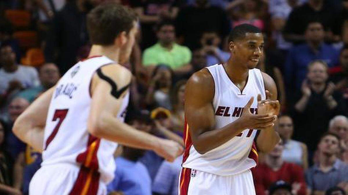 
Miami Heat center Hassan Whiteside, right, celebrates during the fourth quarter against Los Angeles Lakers at AmericanAirlines Arena in Miami on Wednesday, March 4, 2015. At left is Heat guard Goran Dragic.
