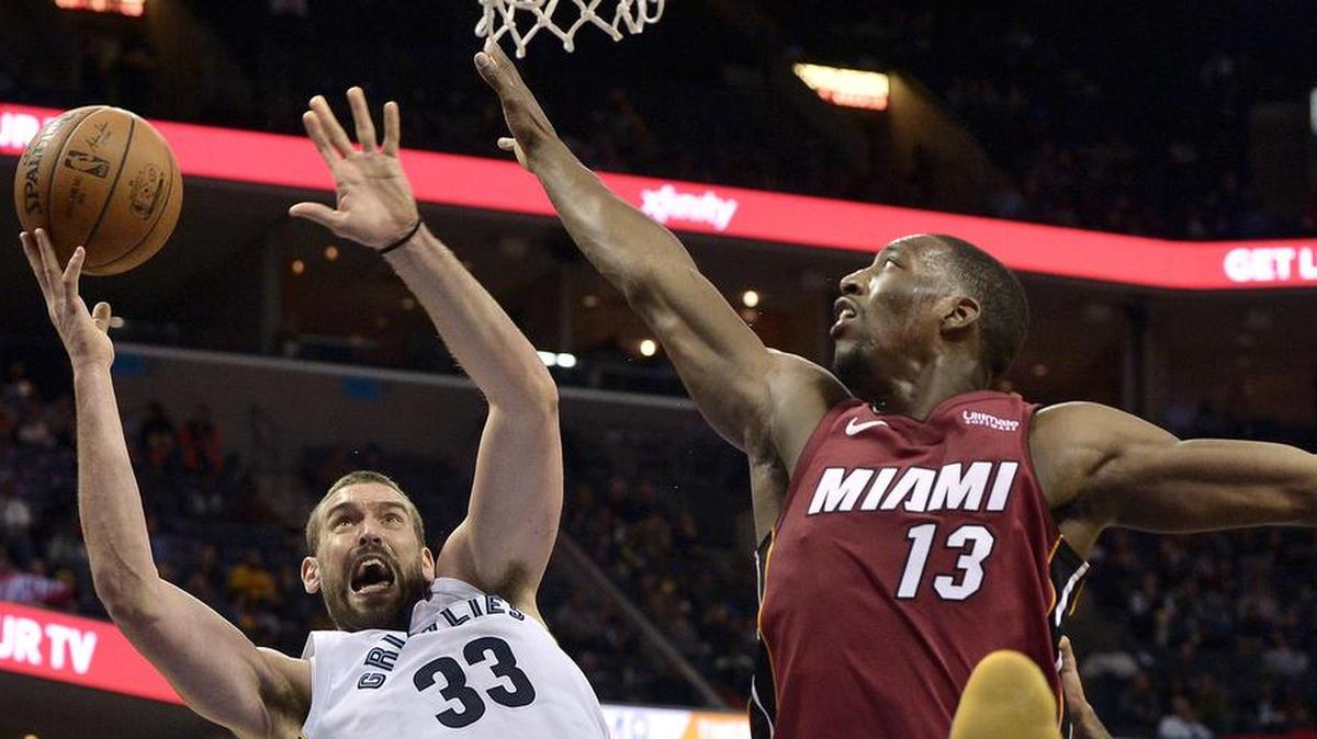 Memphis Grizzlies center Marc Gasol (33) shoots against Miami Heat center Bam Adebayo (13) in the second half of an NBA basketball game Monday, Dec. 11, 2017, in Memphis, Tenn.