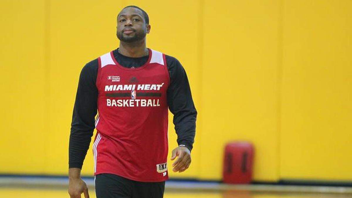
Miami Heat guard Dwyane Wade looks on during team practice at the AmericanAirlines Arena in Miami on Tuesday, Nov. 11, 2014.
