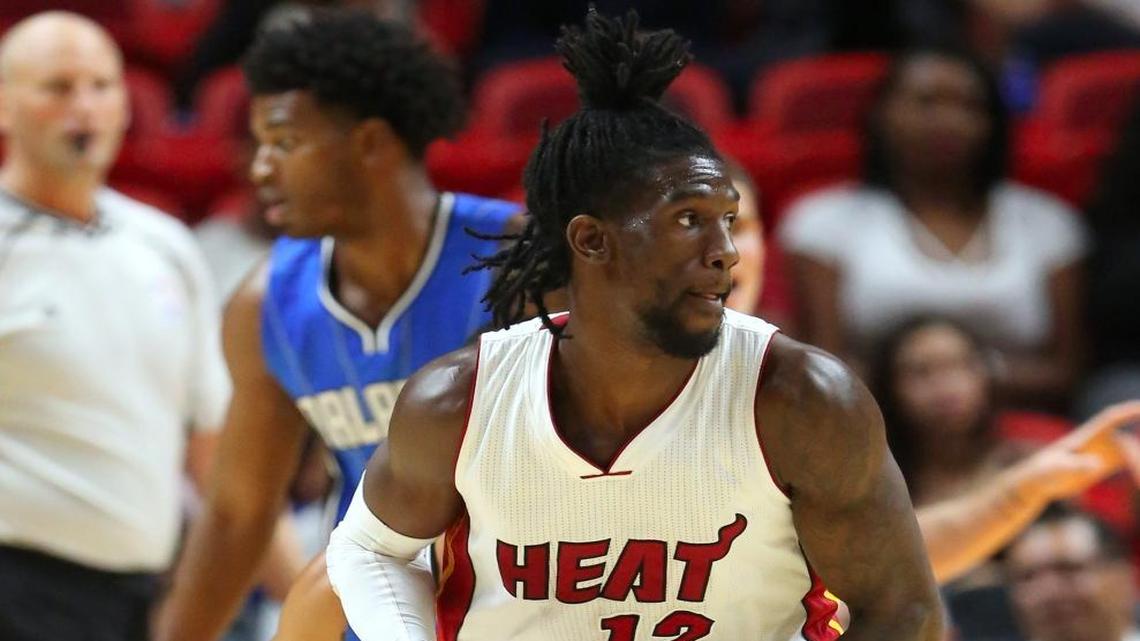 Miami Heat guard Briante Weber drives against Orlando Magic guard Nick Johnson in a preseason game in October 2016. Weber is back with the Heat, trying to win a roster spot in training camp.