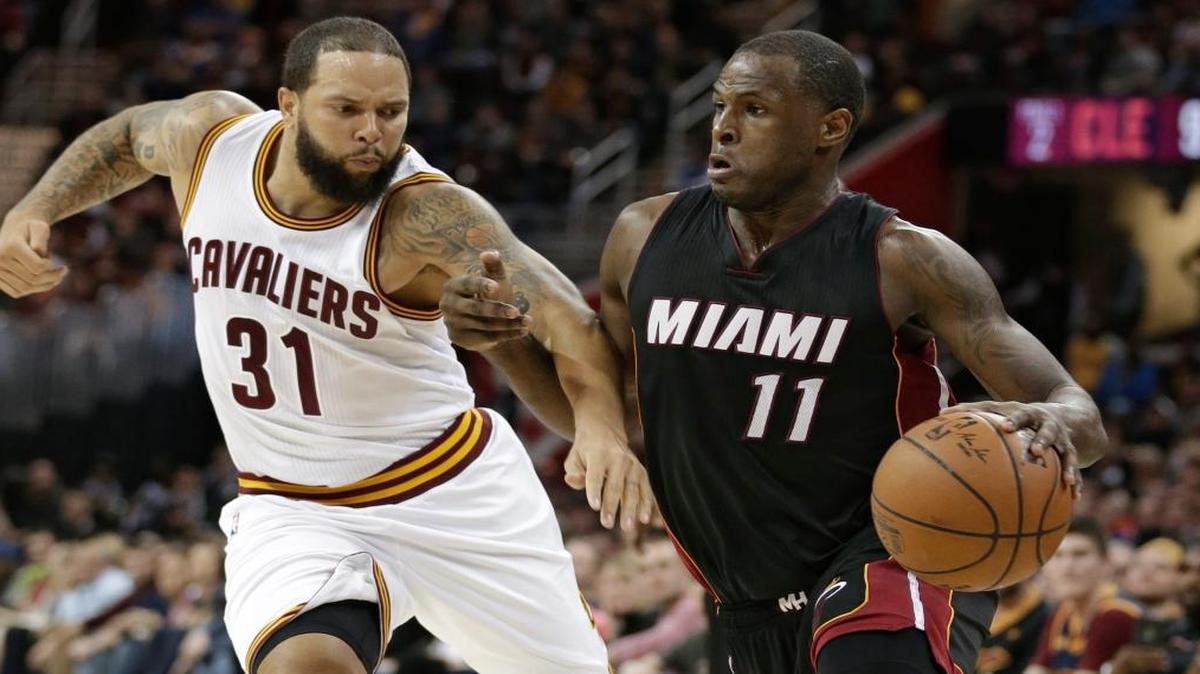 Miami Heat's Dion Waiters (11) drives against Cleveland Cavaliers' Deron Williams (31) in the second half of an NBA basketball game, Mon., March 6, 2017, in Cleveland. The Heat won 106-98.