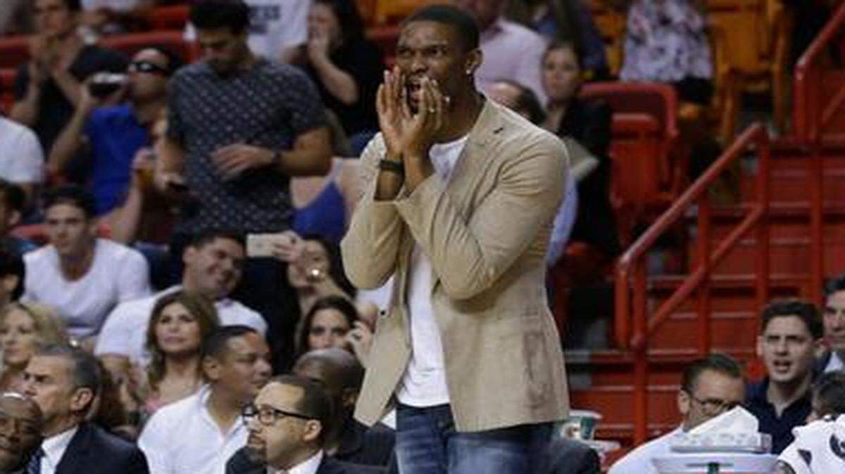 
Miami Heat forward Chris Bosh shouts from the sideline during the second half of a game against the Portland Trail Blazers, Wednesday, March 18, 2015, in Miami. 
