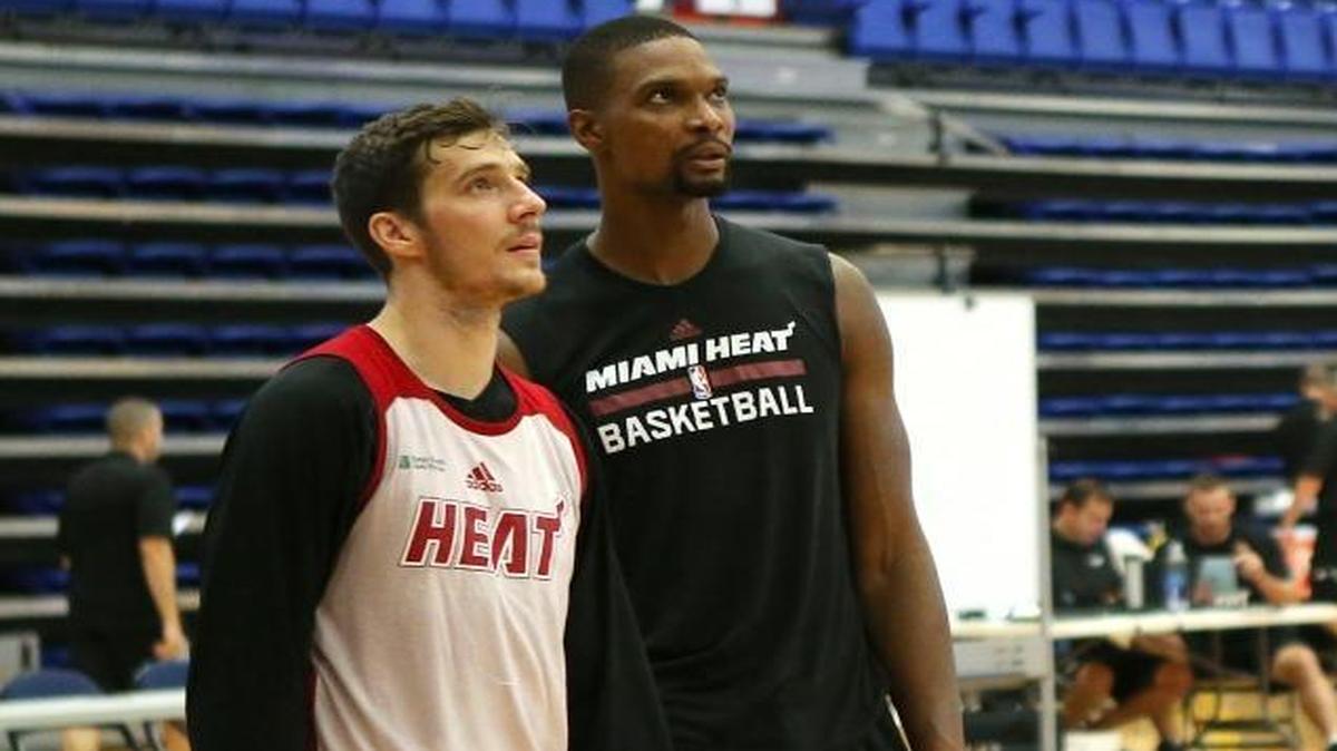 
Goran Dragic, left, talks with Chris Bosh during practice Friday, Oct. 2, 2015. Bosh and Dragic have never played in a regular-season game together. Bosh was hospitalized with blood clots Feb. 19, 2015, the same day Dragic was acquired by Miami.
