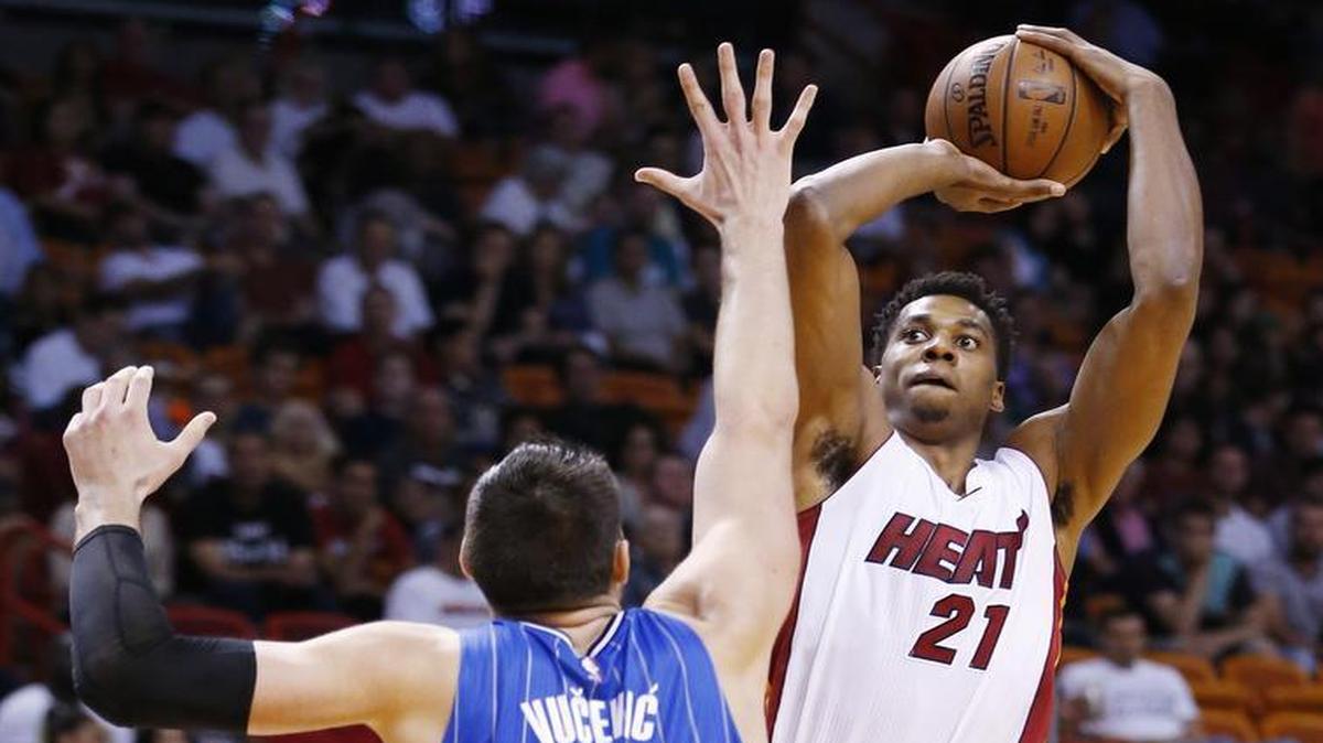 With Hassan Whiteside, right, moving into the starting lineup, Amar’e Stoudemire finds himself back on the bench unsure of his role as the Heat head toward the playoffs