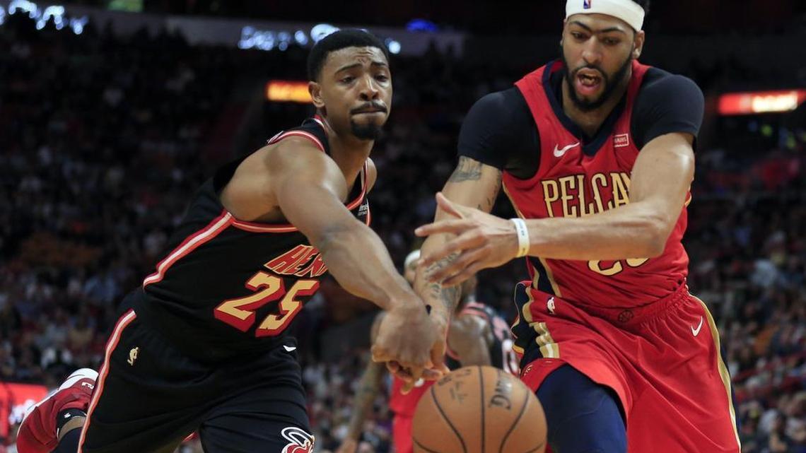 Miami Heat center Jordan Mickey (25) knocks the ball away from New Orleans Pelicans forward Anthony Davis (23) in the fourth quarter of a Dec. 23 game. The Heat declined next season's team option on Mickey's contract.