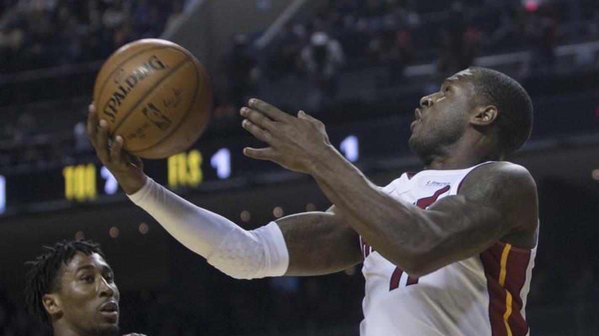 Miami Heat’s Dion Waiters wears an arm sleeve during the first quarter of the team’s NBA basketball game against the Brooklyn Nets in Mexico City Saturday, Dec. 9, 2017. At rear is Nets’ Rondae Hollis-Jefferson.