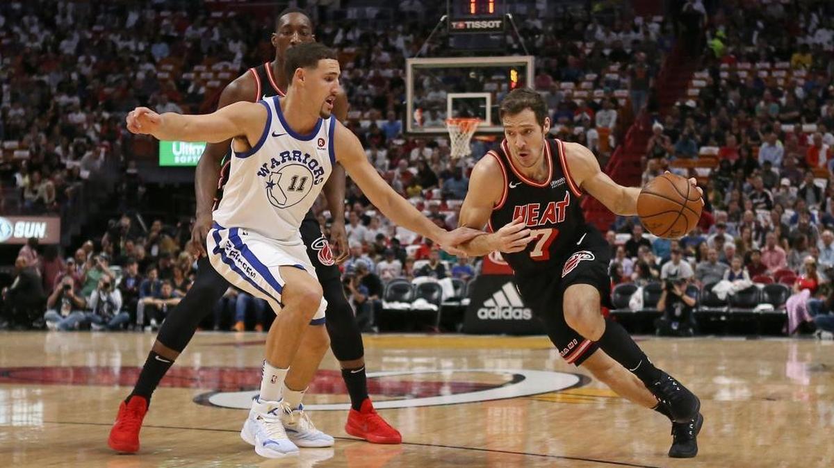 Miami Heat guard Goran Dragic drives against Golden State Warriors guard Klay Thompson in a game earlier this month. Dragic is trying to shake out of a shooting slump.