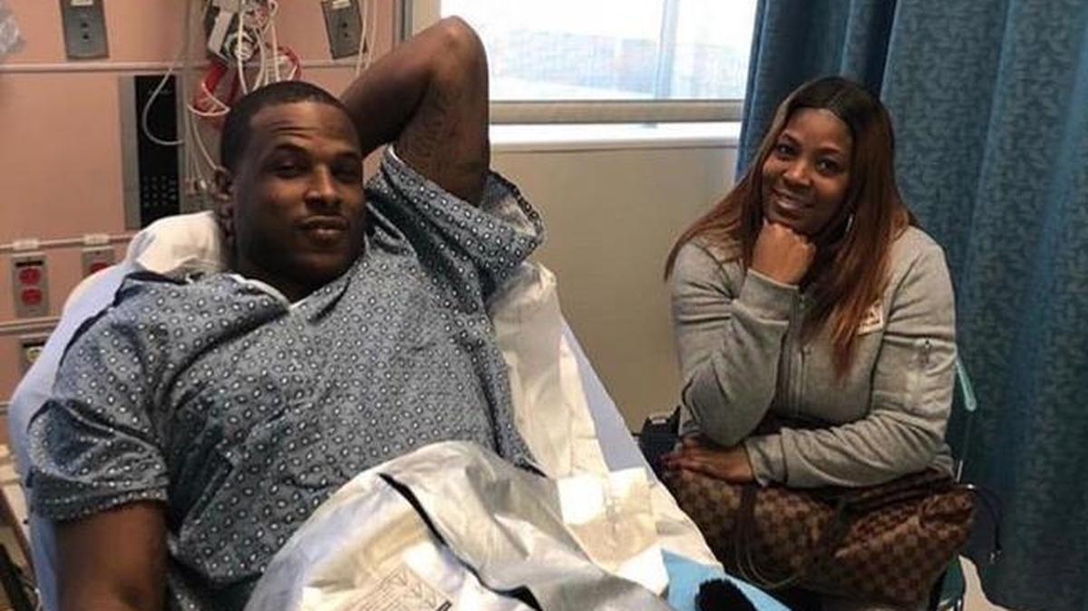 Heat guard Dion Waiters poses for a photo with a family member shortly before going in for left ankle surgery on Monday, Jan. 22, 2018 in Los Angeles.