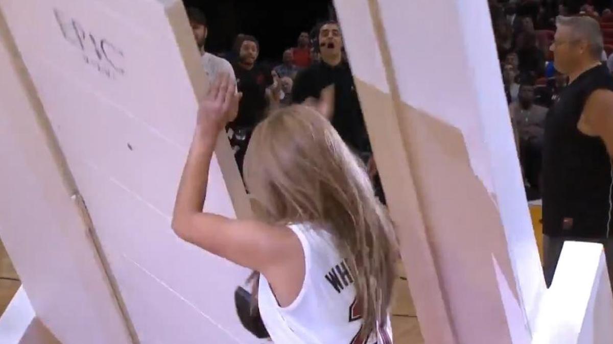 As part of the promotion for Epic Hotel, a woman opened a door constructed into a heavy edifice. The edifice — which was placed at midcourt of AmericanAirlines Arena — tipped over, nearly hitting the stunned woman.