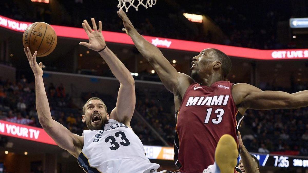 Memphis Grizzlies center Marc Gasol (33) shoots against Miami Heat center Bam Adebayo (13) in the second half Monday, Dec. 11, 2017, in Memphis, Tenn.