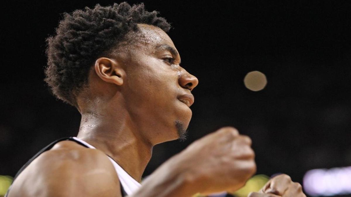 Hassan Whiteside reacts after a play in the second quarter of the Miami Heat's game against the Portland Trail Blazers on Sunday, Dec. 20, 2015 at AmericanAirlines Arena in Miami.