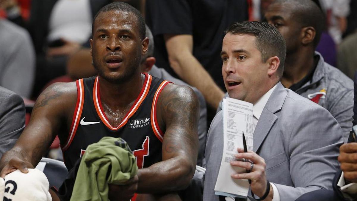 Miami Heat assistant coach Dan Craig talks with Heat guard Dion Waiters during the first quarter of a game against the Washington Wizards at the AmericanAirlines Arena in Miami on Wednesday, November 15, 2017.