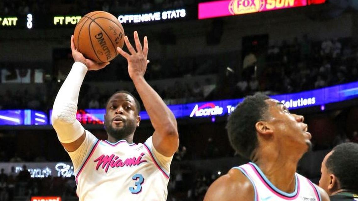 Miami Heat Dwyane Wade shoots the ball in the first quarter as they play the Milwaukee Bucks at the AmricanAirline Arena in Miami, Florida, Feb. 9, 2018.