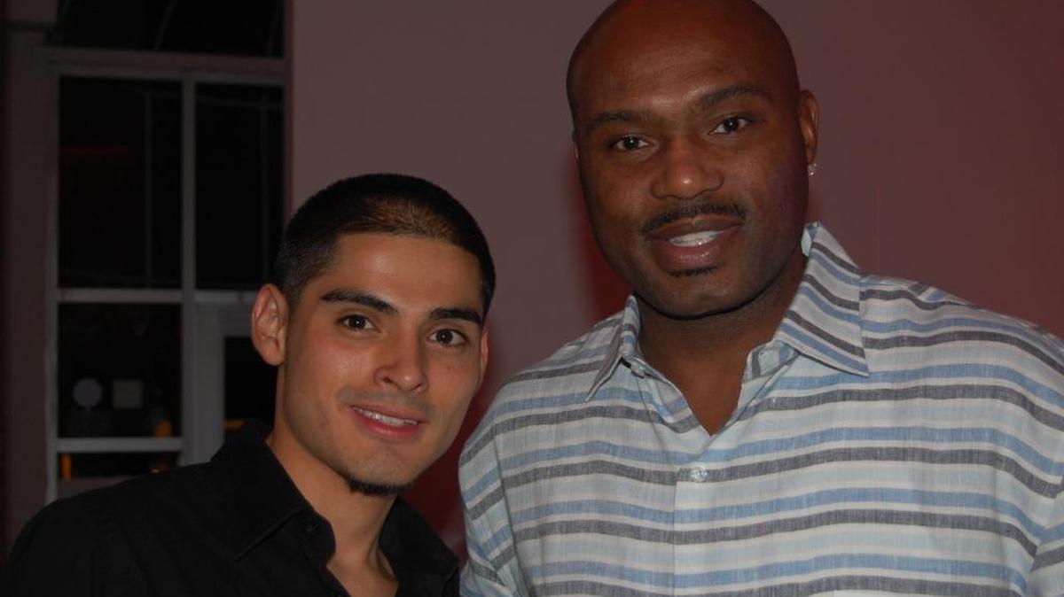 Tim Hardaway with Geo Bustamante, a young gay man, at a Sept. 2009 Trevor Project fundraiser in South Beach. The cocktail reception marked the former Miami Heat star’s first public appearance at an LGBTQ event after his highly publicized 2007 appearance on Dan Le Batard’s radio show.