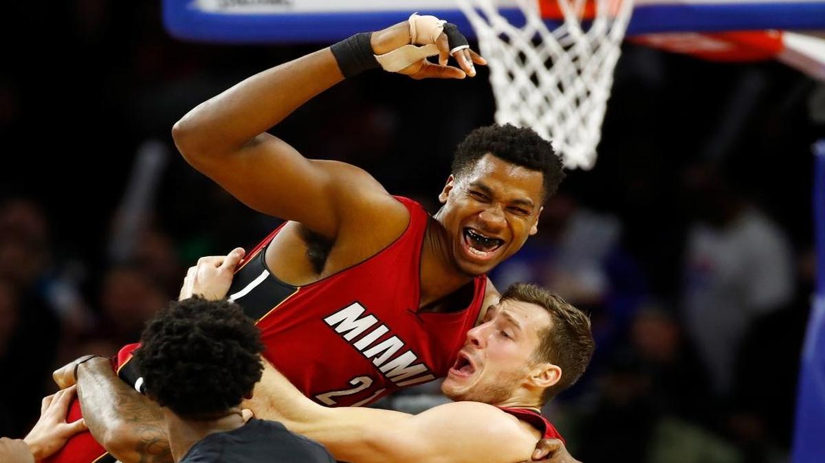 Miami Heat’s Hassan Whiteside (21) celebrates his buzzer-beating game-winning basket with Goran Dragic (7) while playing the Detroit Pistons at the Palace of Auburn Hills on March 28, 2017, in Auburn Hills, Michigan.