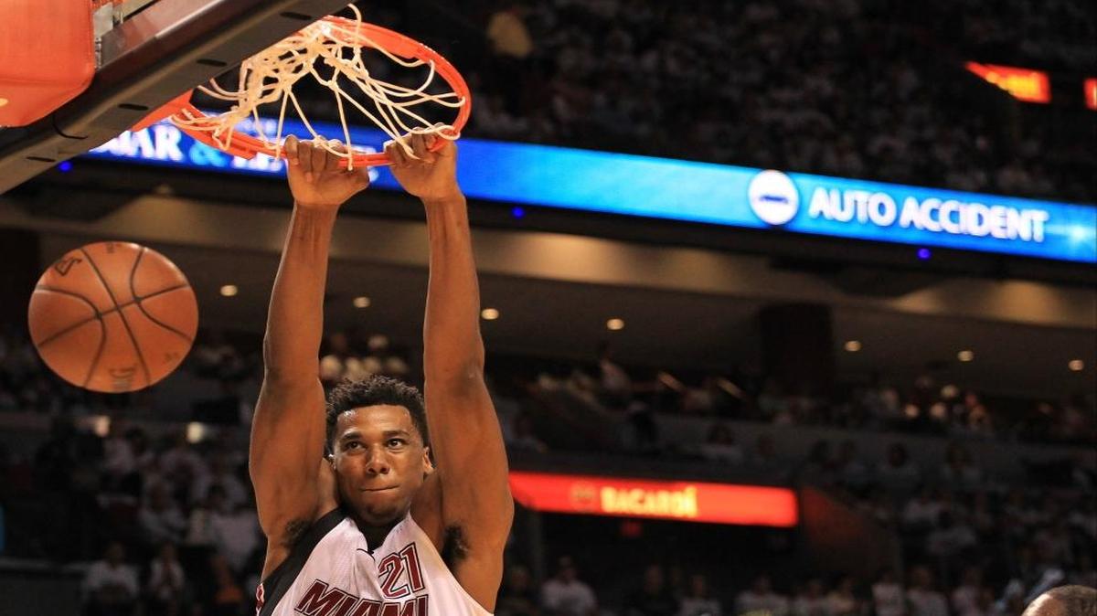 Hassan Whiteside dunks with power over Hornets players in Game 1 of the first round of the Eastern Conference playoffs on Sunday April 17, 2016 at the American Airlines Arena.