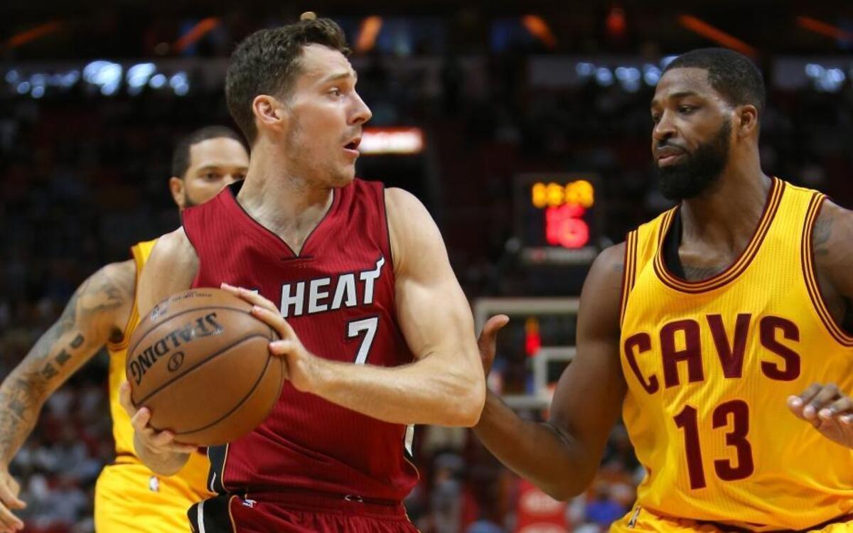 Miami Heat guard Goran Dragic drives against Cleveland Cavaliers center Tristan Thompson during the first quarter of an NBA basketball game at AmericanAirlines Arena in Miami on March 4, 2017.