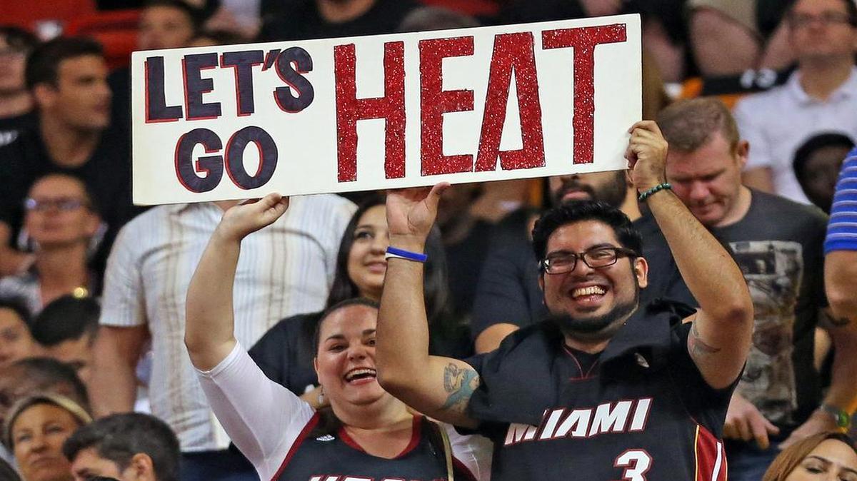 Heat fans cheer as the Miami Heat plays the Charlotte Hornets at AmericanAirlines Arena in Miami on October 28, 2015.