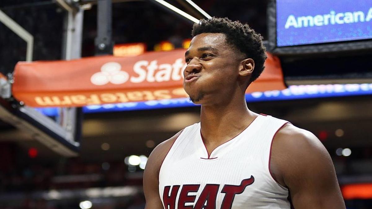 Miami Heat's center Hassan Whiteside, reacts after scoring against Philadelphia's forward Richaun Holmes in the second quarter of their game at AmericanAirlines Arena in Miami on Oct. 21, 2016.