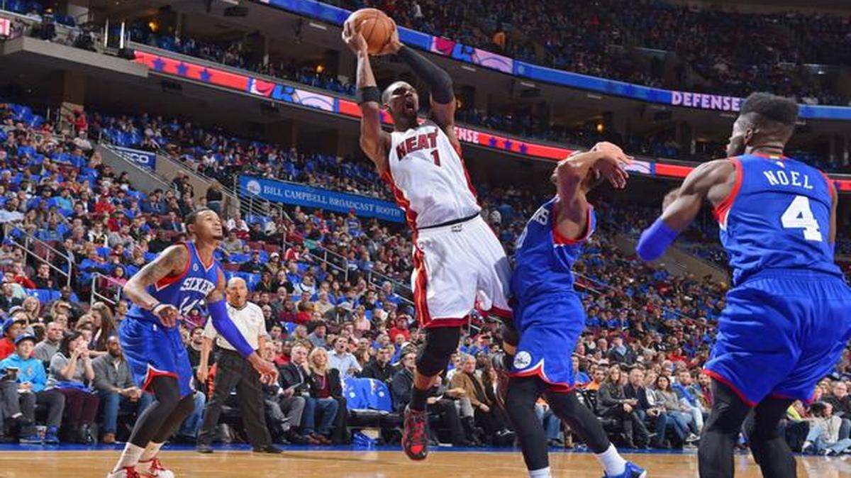 
Chris Bosh #1 of the Miami Heat takes a shot against the Philadelphia 76ers during the game on November 1, 2014 at the Wells Fargo Center in Philadelphia, Pennsylvania. 
