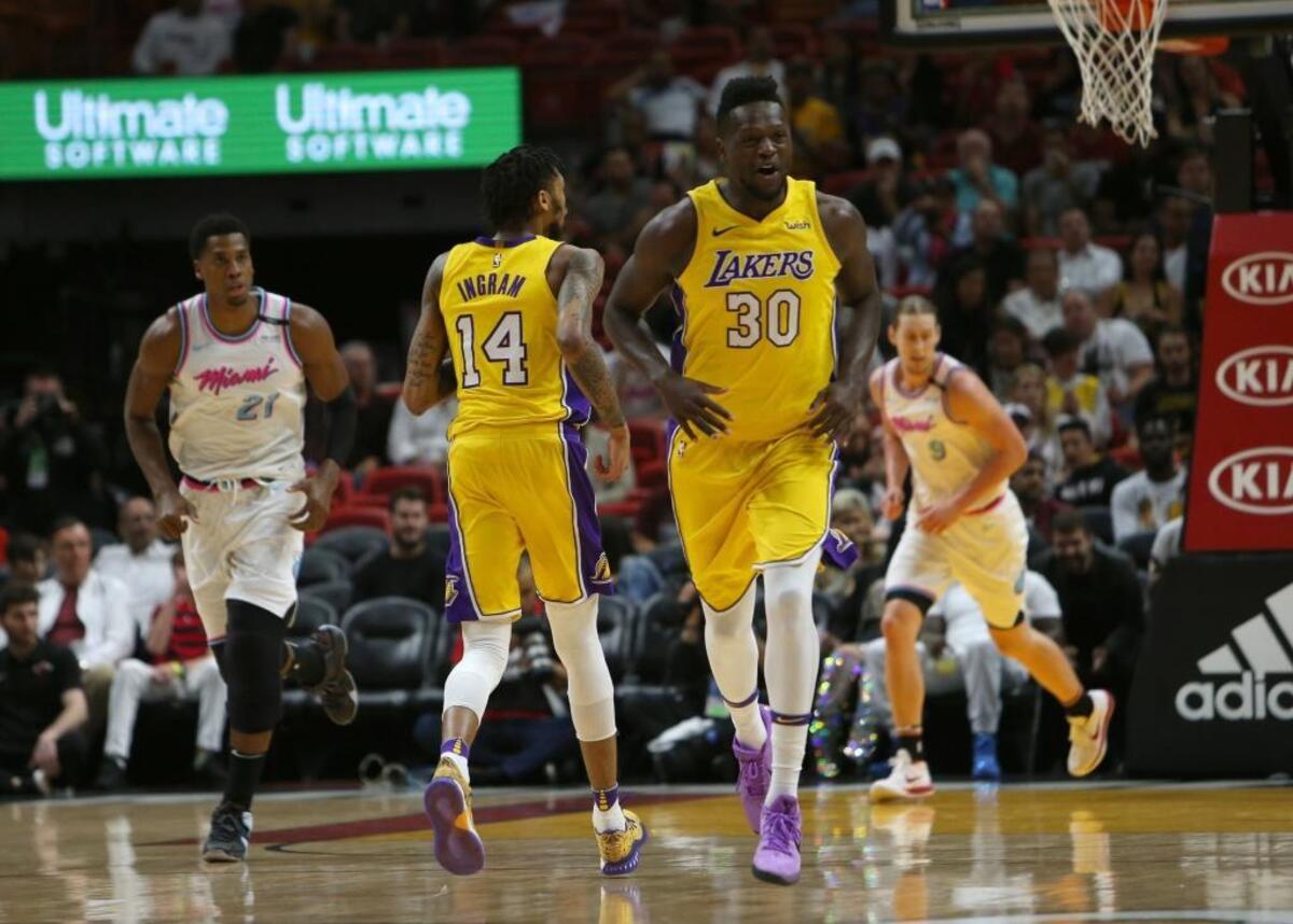 Los Angeles Lakers forward Julius Randle reacts after scoring during the first quarter against the Miami Heat at the AmericanAirlines Arena in Miami on Thursday, March 1, 2018.