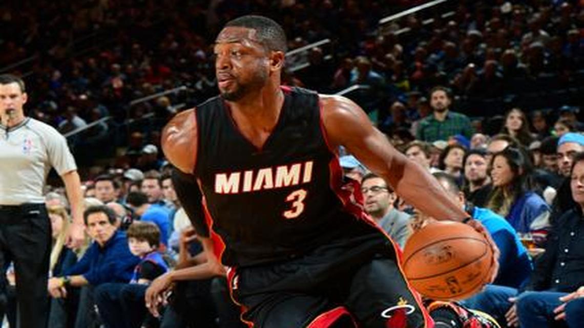 
Miami Heat guard Dwyane Wade drives to the basket against the New York Knicks at Madison Square Garden in New York on Nov. 30, 2014.
