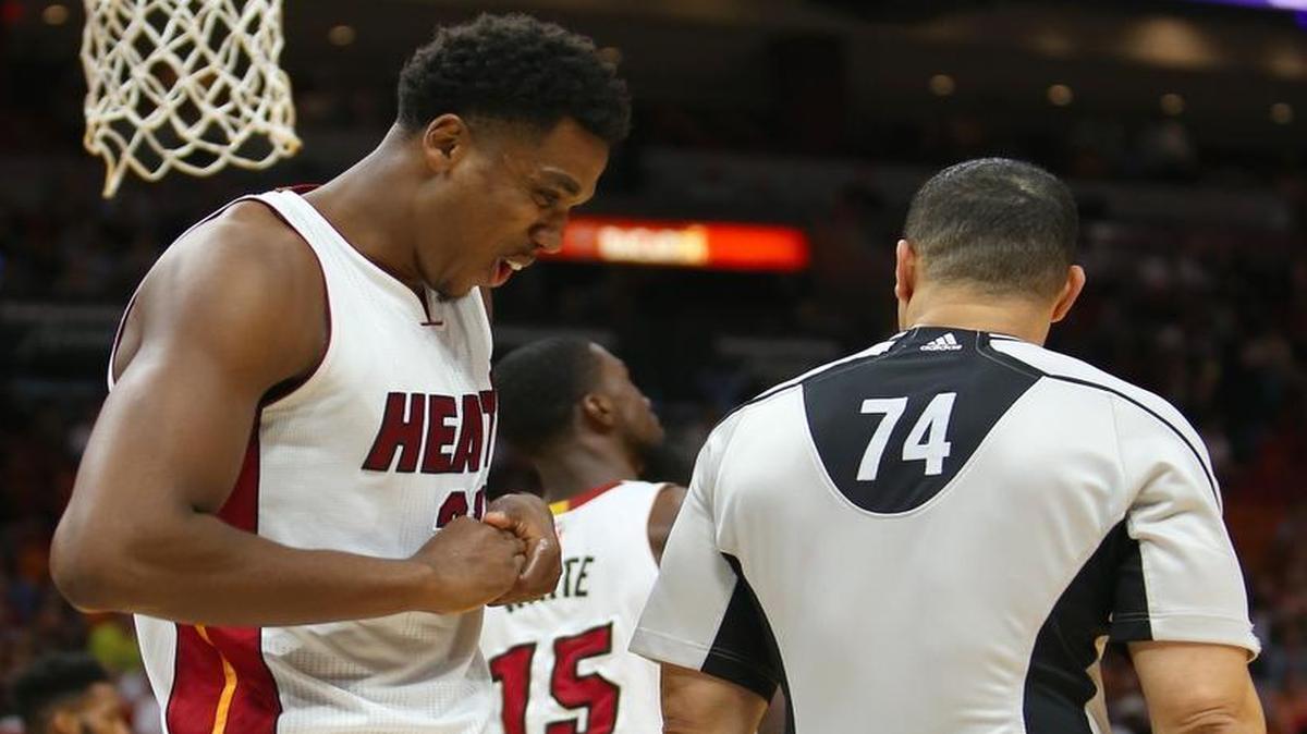 Miami Heat center Hassan Whiteside holds his hand after cutting it during a play in the fourth quarter of an NBA basketball game against the Phoenix Suns at AmericanAirlines Arena in Miami on Tues., March 21, 2017. He needed 13 stitches to close the cut.