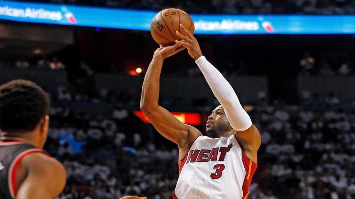 Miami Heat's Dwyane Wade shoots a three pointer in the third quarter as they play the Toronto Raptors in Round 2, Game 3, of the NBA Playoffs at the AmericanAirlines Arena in Miami, Florida, May 7, 2016.