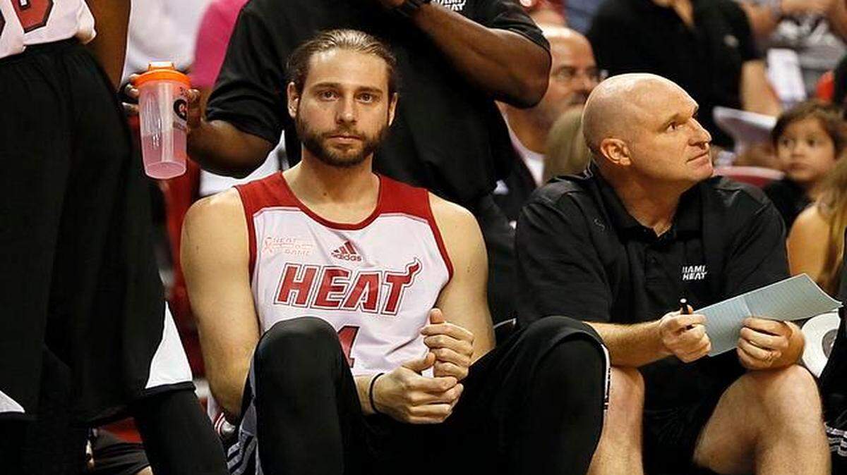 
Miami Heat forward Josh McRoberts sits on the bench during a practice game at AmericanAirlines Arena in Miami on Oct. 1 2014.
