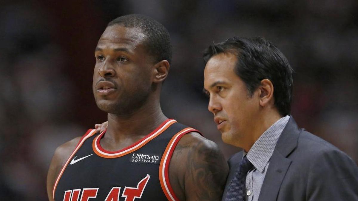 Miami Heat coach Erik Spoelstra talks with guard Dion Waiters during the first quarter of an NBA basketball game against the Golden State Warriors at the AmericanAirlines Arena in Miami on Sunday, December 3, 2017.