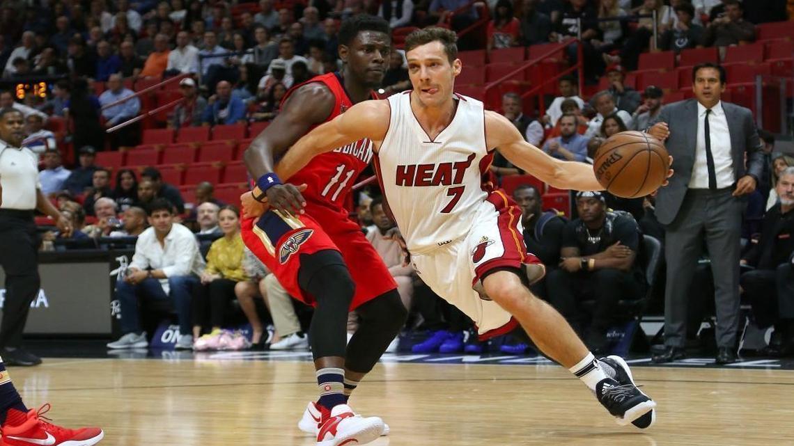 Miami Heat guard Goran Dragic drives against New Orleans Pelicans guard Jrue Holiday during the first quarter of an NBA basketball game at AmericanAirlines Arena in Miami on Wed., March 15, 2017.