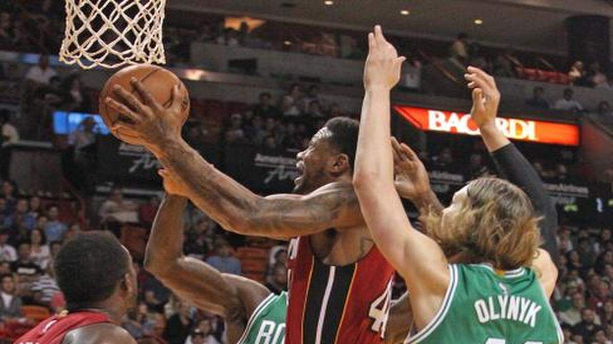 
Miami Heat forward Udonis Haslem tries to score in the first quarter during a game against the Boston Celtics at the AmericanAirlines Arena on Sunday, Dec. 21, 2014.
